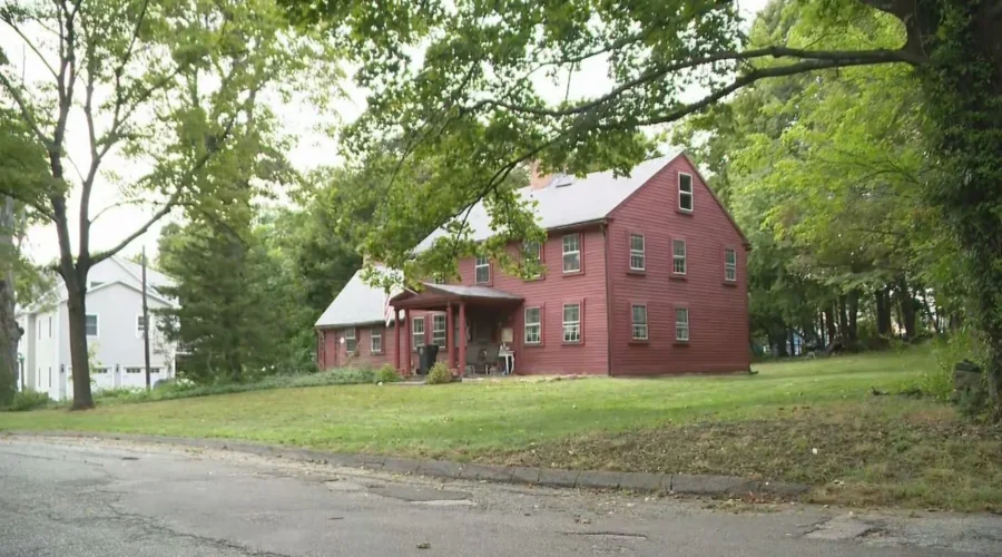 Police and bomb squad response near a Cranston home after a grenade was found in a shed